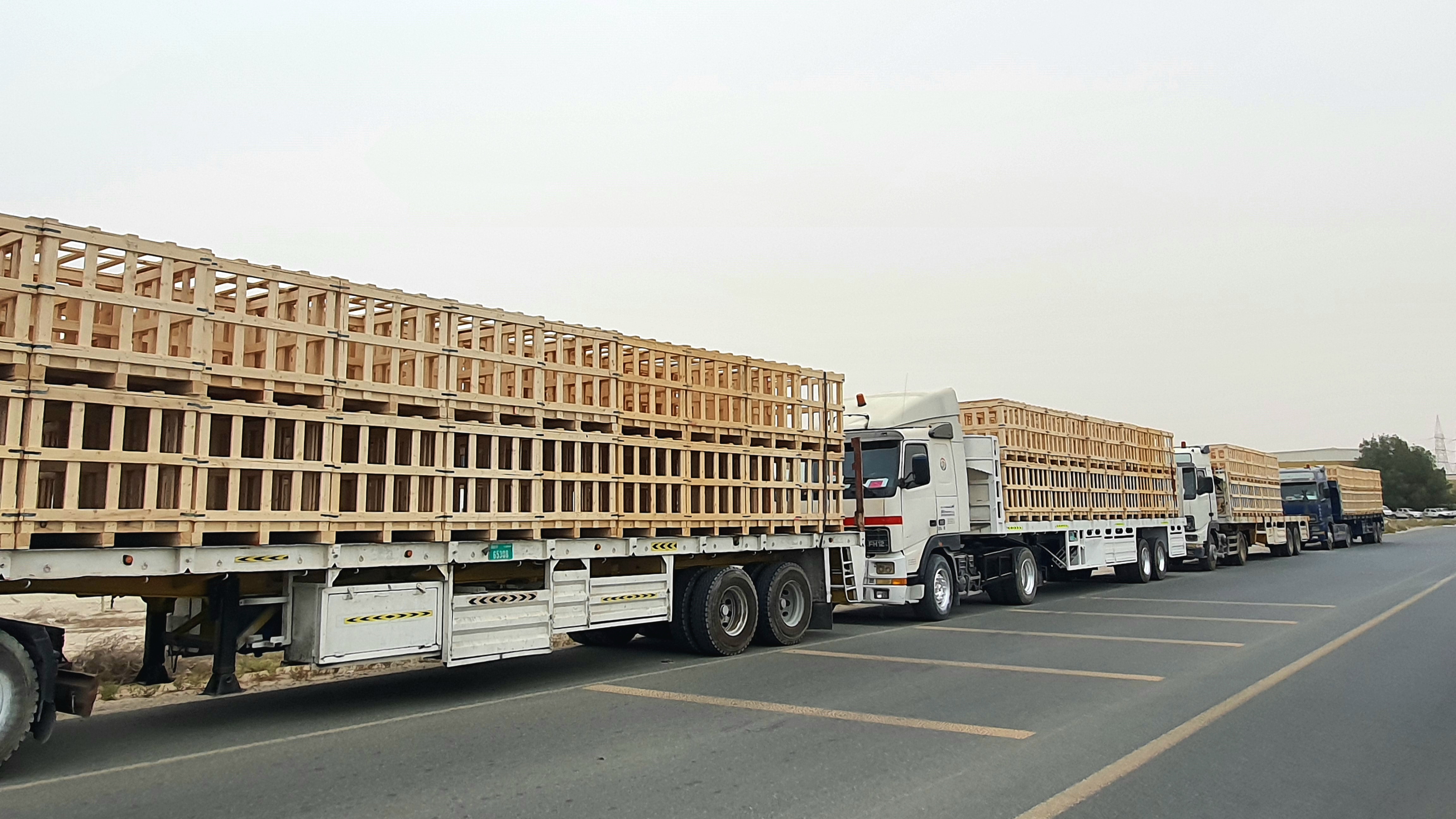 Row of precision pinewood export crates